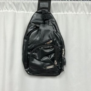 Black leather strap bag